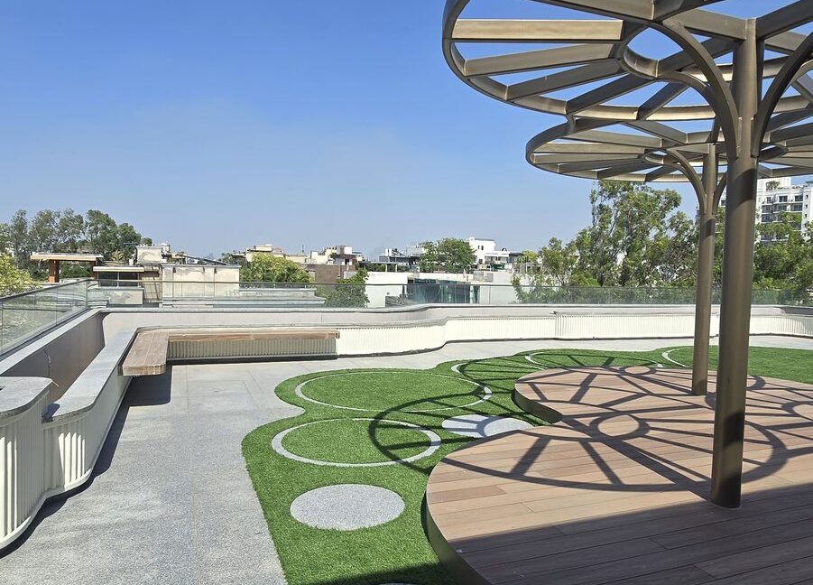 RS Buildtech Rooftop Terrace with Umbrella Pergolas | Luxury Builder Floor by Ravinder Singh Marwah