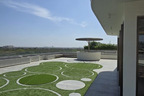 RS Buildtech Terrace Lawn with Granite Circle Inlays | Luxury Property by Ravinder Singh Marwah