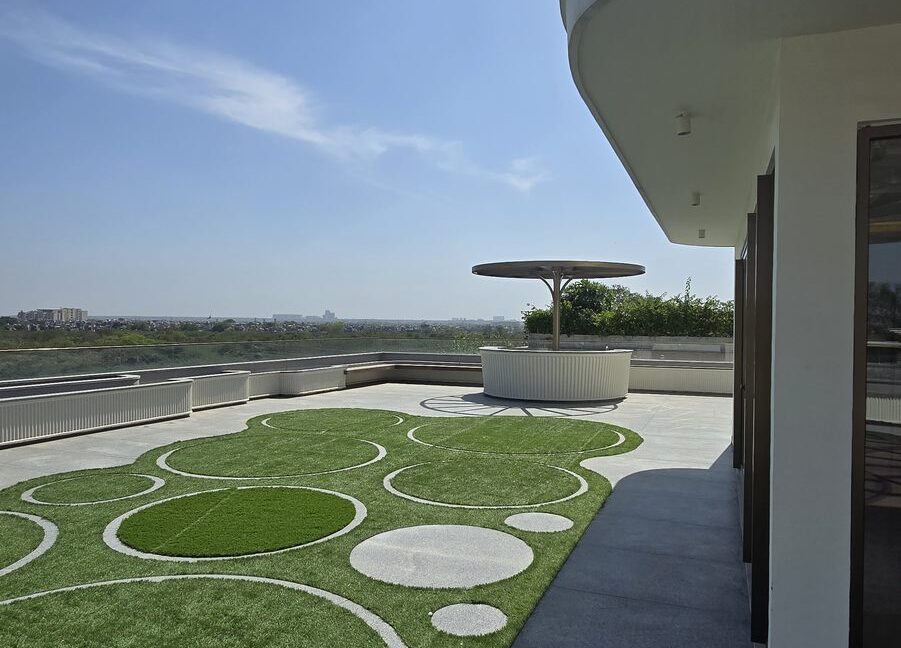 RS Buildtech Terrace Lawn with Granite Circle Inlays | Luxury Property by Ravinder Singh Marwah
