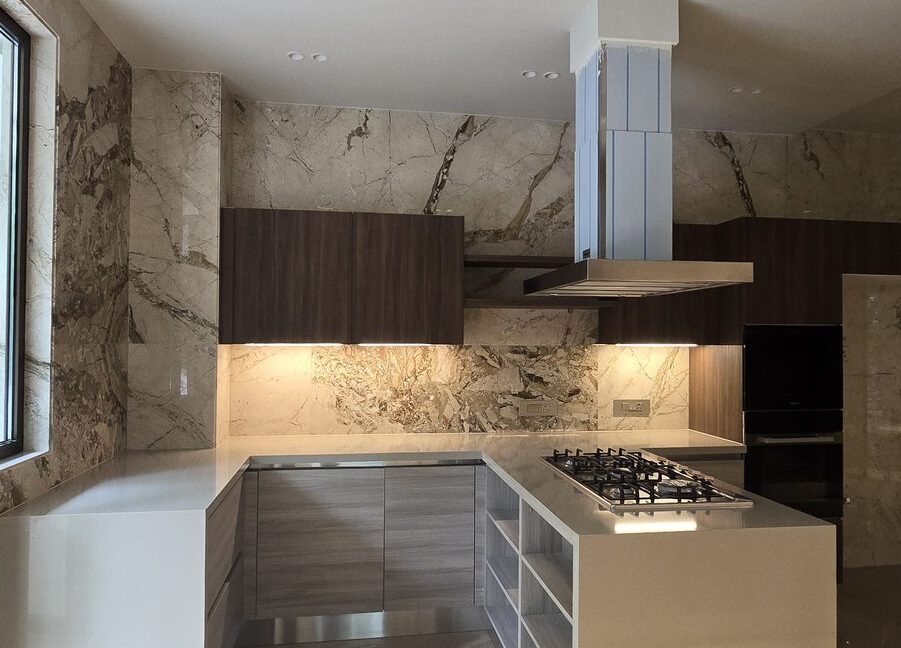 RS Buildtech U-Shaped Kitchen | Luxury Builder Floor by Ravinder Singh Marwah