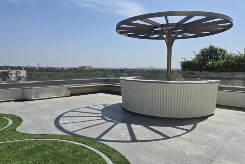 RS Buildtech Umbrella Pergola over Round Bar Counter | Developer Ravinder Singh Marwah