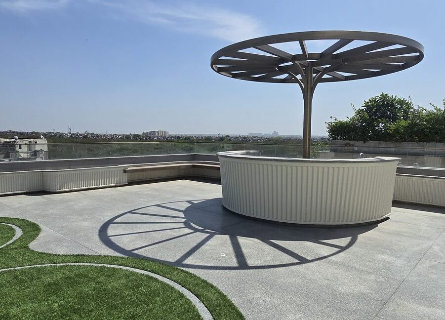 RS Buildtech Umbrella Pergola over Round Bar Counter | Developer Ravinder Singh Marwah