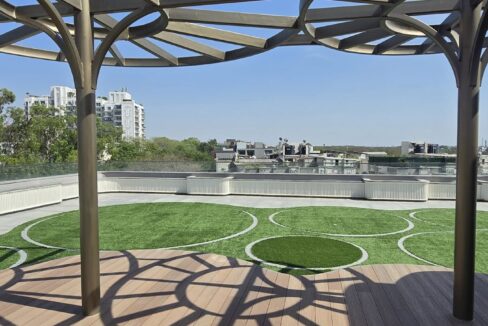 RS Buildtech Wooden Deck with Lattice Shadows | Luxury Builder Floor by Ravinder Singh Marwah