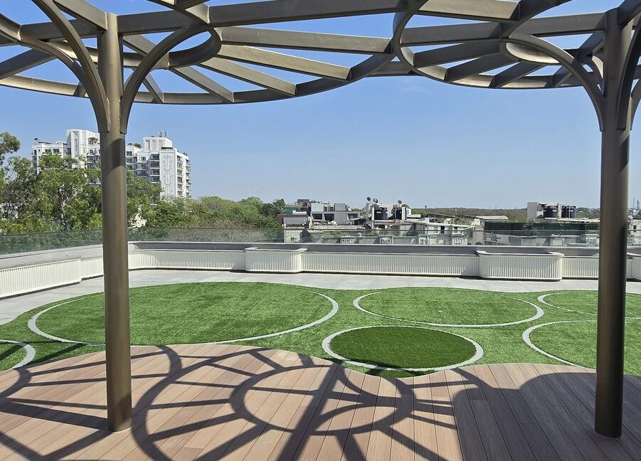 RS Buildtech Wooden Deck with Lattice Shadows | Luxury Builder Floor by Ravinder Singh Marwah