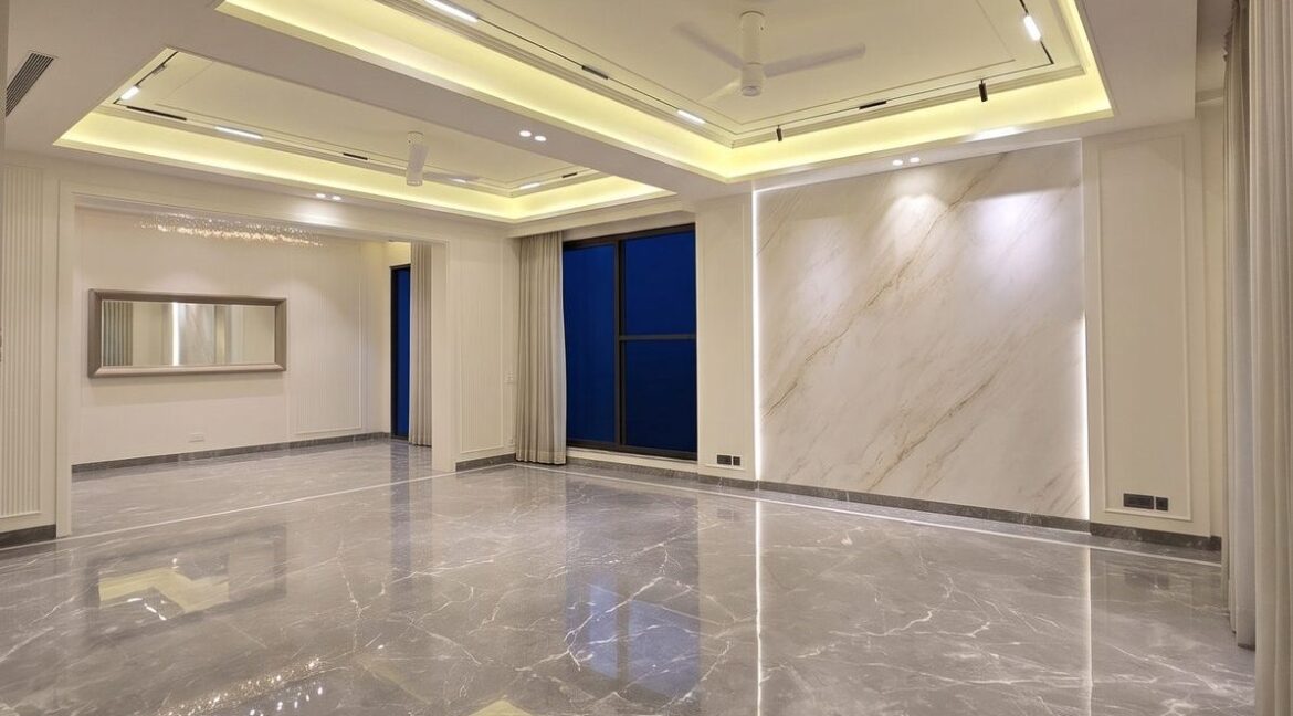 Triplex in Vasant Vihar – grand living room in Italian marble