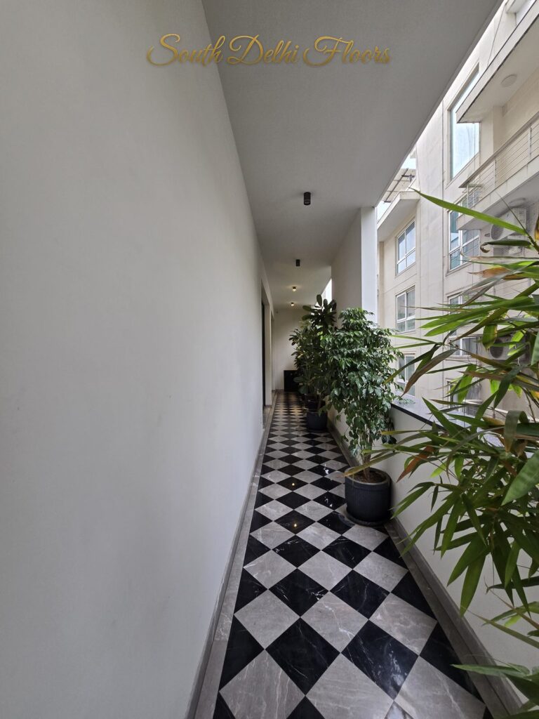 Balcony checkered floor at a Windchimes Construction builder floor in South Delhi