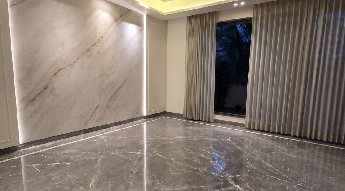 Windchimes Construction Bare Drawing Room Backlit Wall At Night - Rajesh Kumar