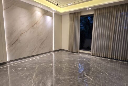 Windchimes Construction Bare Drawing Room Backlit Wall At Night - Rajesh Kumar