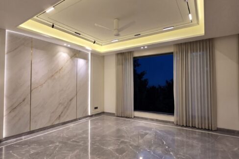 Windchimes Construction Bare Drawing Room Marble Wall At Night - Surbhi Nandrajog