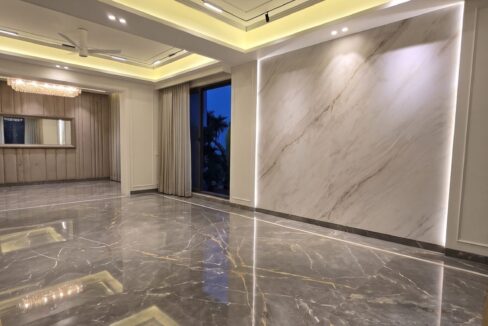 Windchimes Construction Bare Living Room Feature Wall At Night - Surbhi Nandrajog