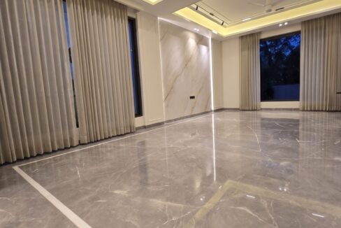 Windchimes Construction Bare Living Room Glossy Marble At Night - Rajesh Kumar