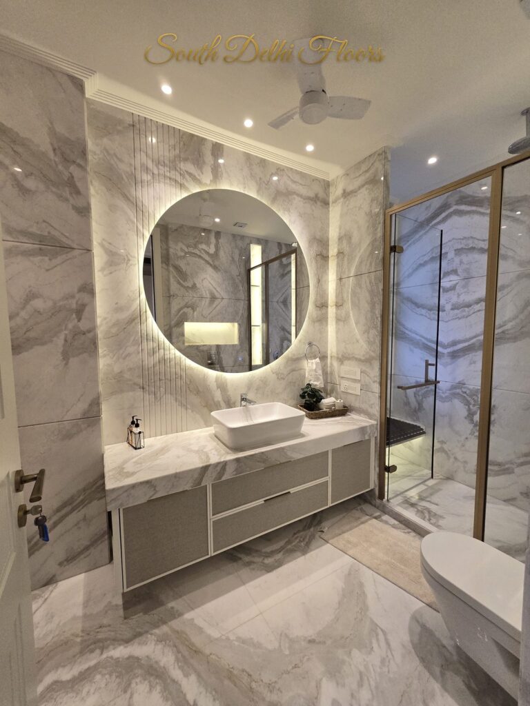 Bathroom round LED mirror, South Delhi builder floor by Windchimes, photographed by SouthDelhiFloors