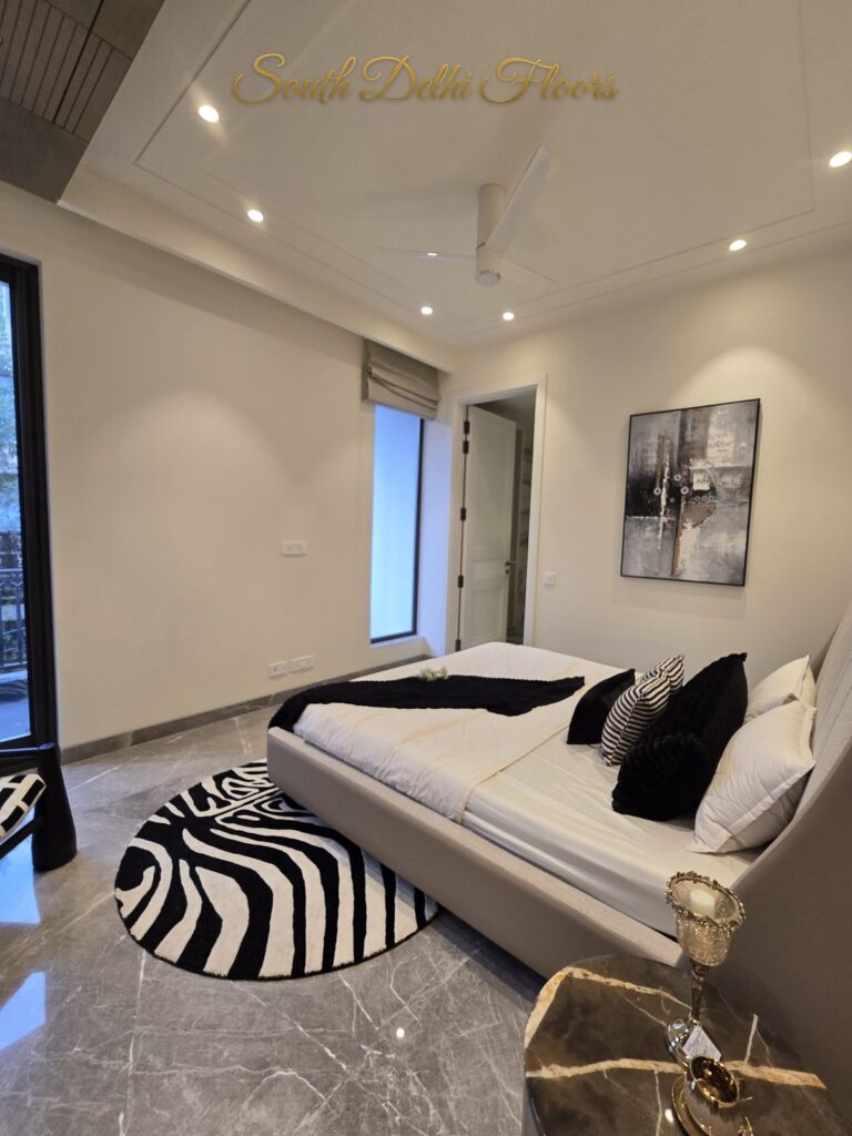 Bedroom zebra rug at a Windchimes Construction builder floor in South Delhi