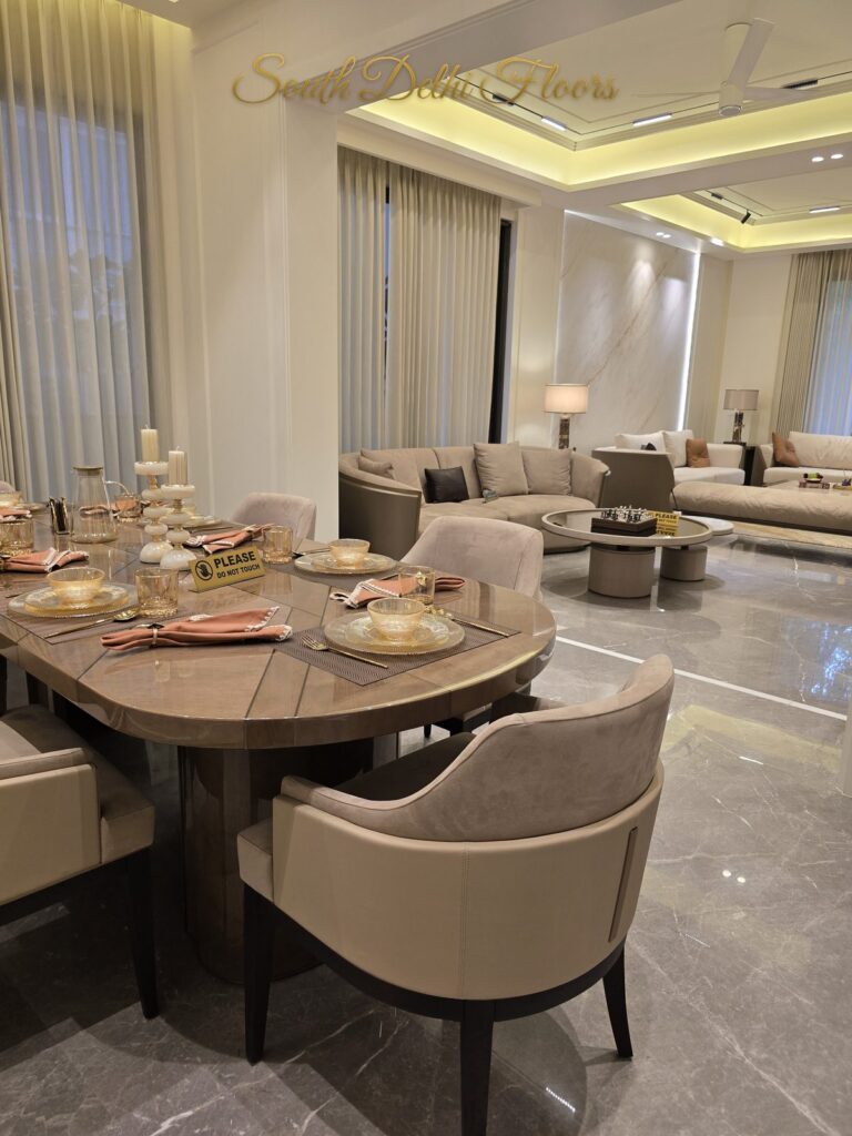 Dining living open plan at a Windchimes Construction builder floor in South Delhi