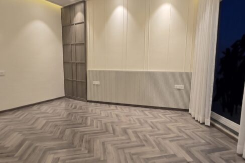 Windchimes Construction Empty Guest Bedroom Panelled Wall At Night - Rajesh Kumar