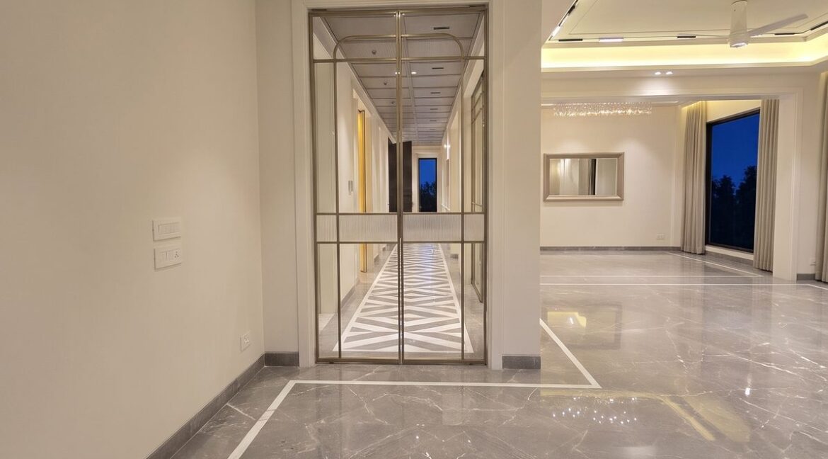 Windchimes Construction Empty Sitting Corner Glass Door At Night - Rajesh Kumar