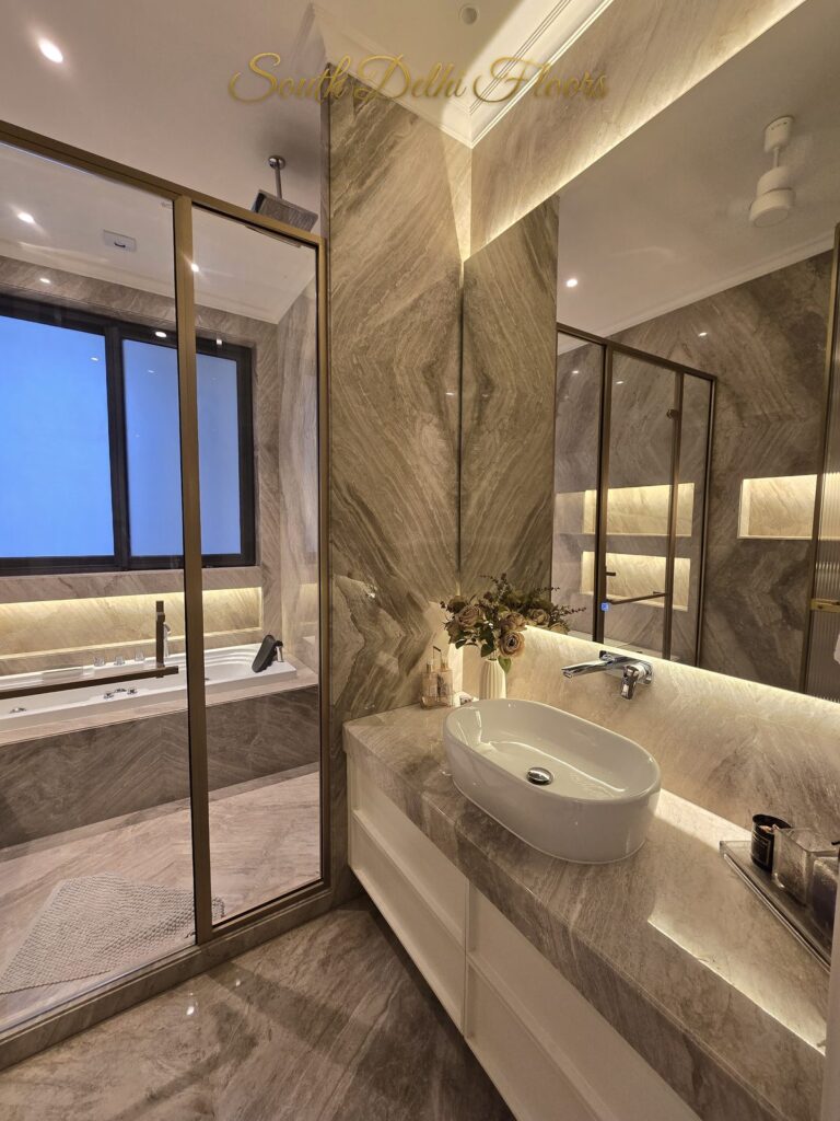 Master bathroom vessel basin at a Windchimes Construction builder floor in South Delhi