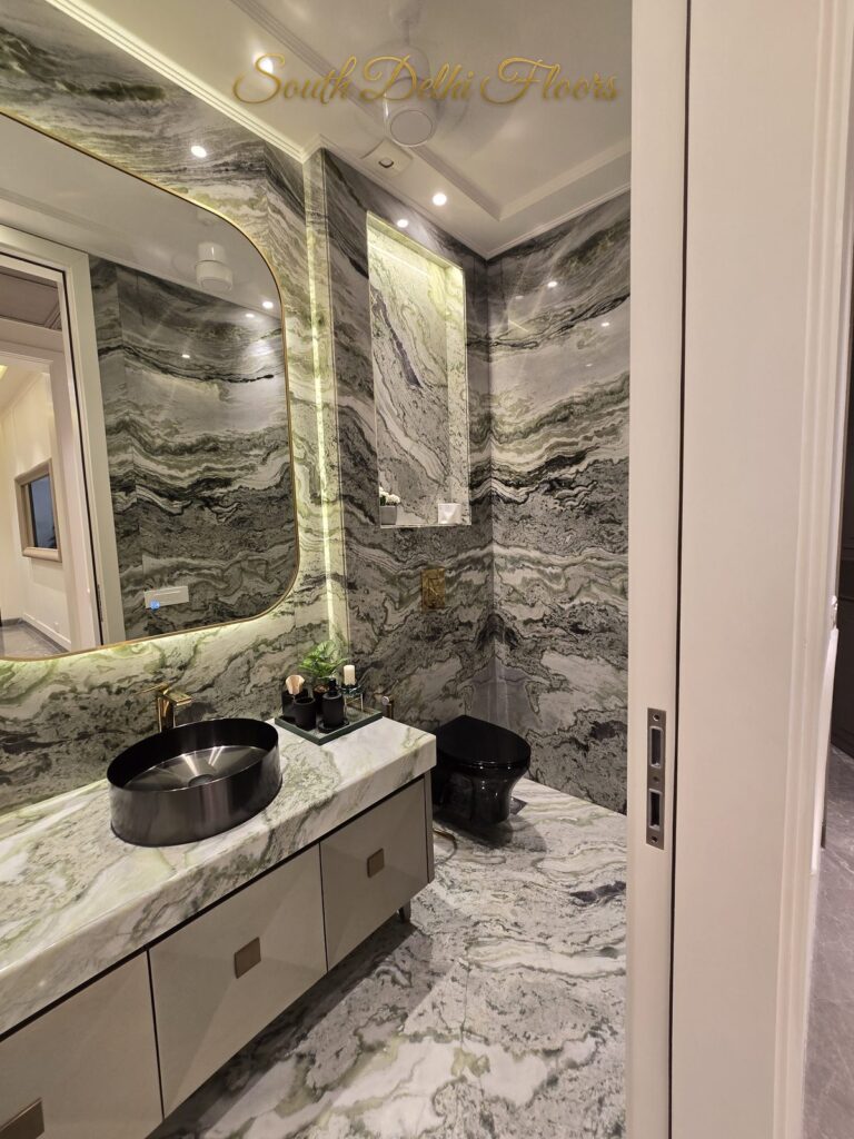 Powder room green marble at a Windchimes Construction builder floor in South Delhi