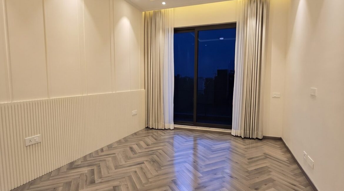 Windchimes Construction Unfurnished Bedroom Balcony Door At Night - Amrit Lal