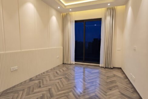 Windchimes Construction Unfurnished Bedroom Balcony Door At Night - Amrit Lal