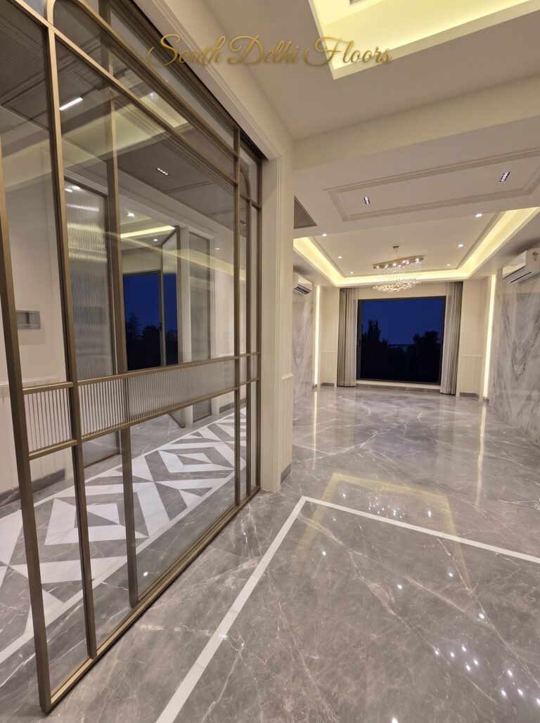 Unfurnished glass-partition corner of a Windchimes floor at night, South Delhi builder floor by Windchimes, photographed by SouthDelhiFloors