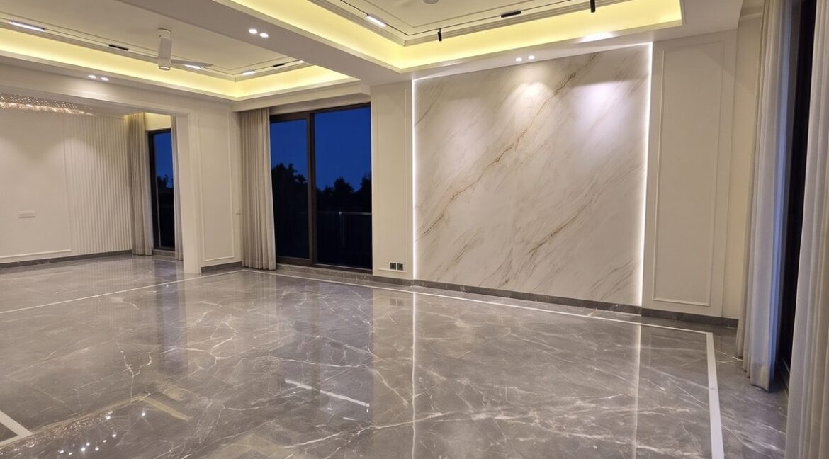 Windchimes Construction Unfurnished Living Hall Wide At Night - Amrit Lal