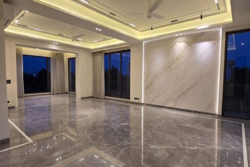 Windchimes Construction Unfurnished Living Room Cove Lighting At Night - Amrit Lal