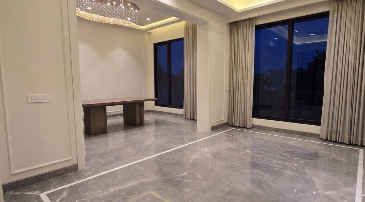 Windchimes Construction Unfurnished Lounge Dining View At Night - Rajesh Kumar