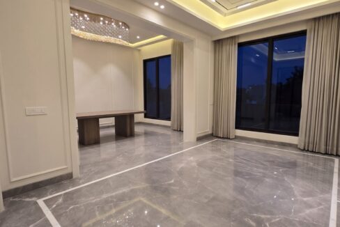 Windchimes Construction Unfurnished Lounge Dining View At Night - Rajesh Kumar