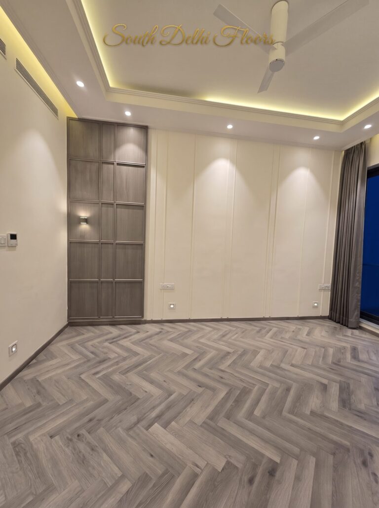 Bedroom herringbone wood floor at night, South Delhi builder floor by Windchimes, photographed by SouthDelhiFloors