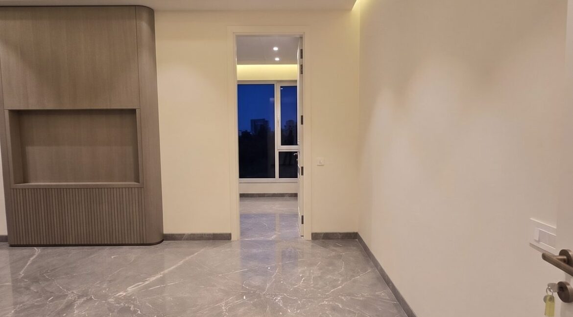 Windchimes Construction Vacant Bedroom TV Unit At Night - Rajesh Kumar