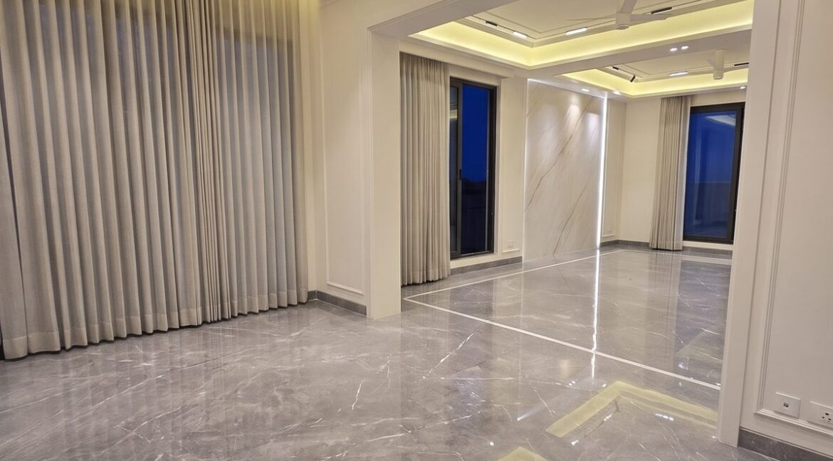Windchimes Construction Vacant Dining Area Living View At Night - Amrit Lal