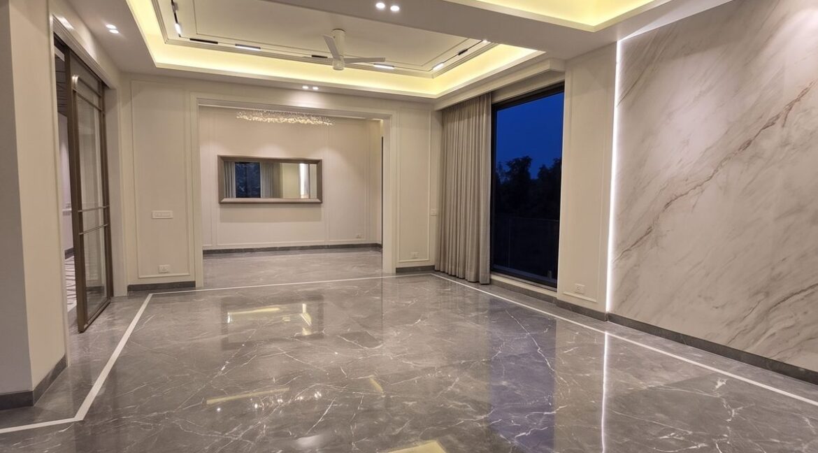 Windchimes Construction Vacant Drawing Room Glossy Floor At Night - Builder