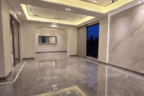 Windchimes Construction Vacant Drawing Room Glossy Floor At Night - Builder