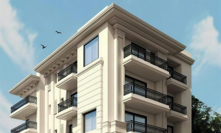 Elevation render of the Windchimes Constructions building at 2/14 Shanti Niketan, New Delhi: cream neoclassical facade with wrought-iron balconies